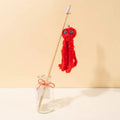 Furry octopus cat toy on long stick in bright colours for indoor kittens