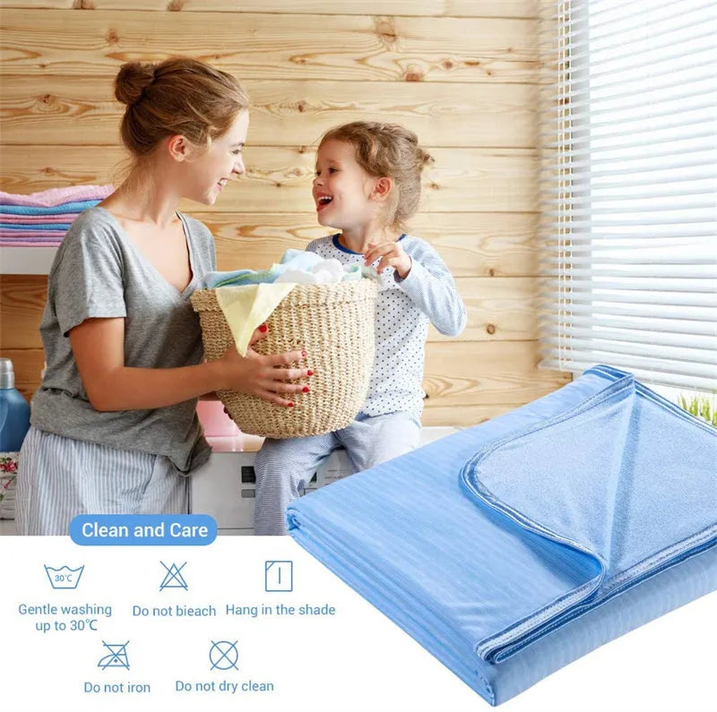 Blue cooling blanket with Q-Max 0.4 cooling fibers, polyester fabric, folded on a bed