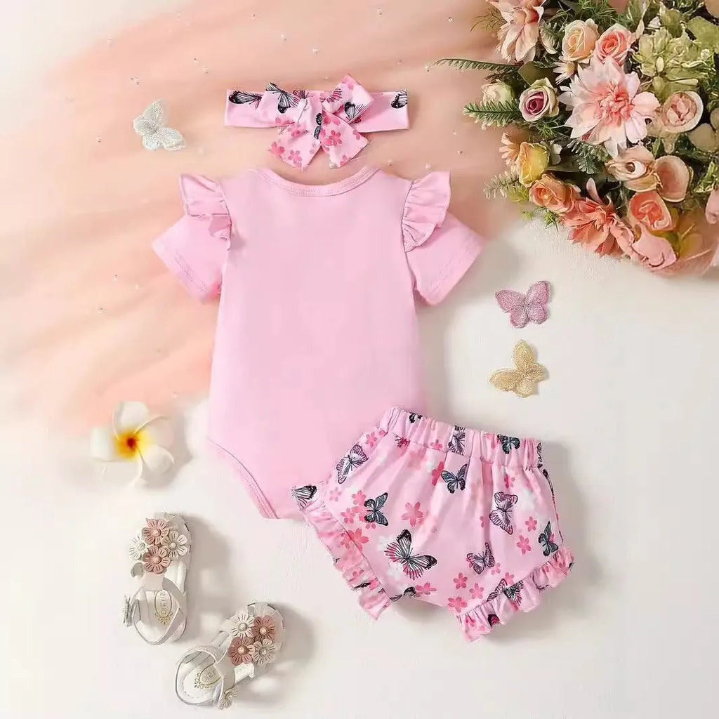 Baby girls summer two-piece set in peach with butterfly letter print short sleeve top and shorts on white background