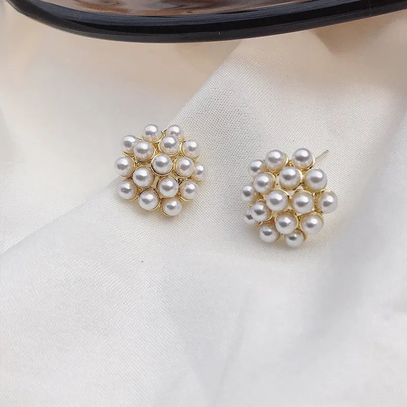 Korean style pineapple and starfish pearl earrings with electroplated alloy construction and artificial gem accents.