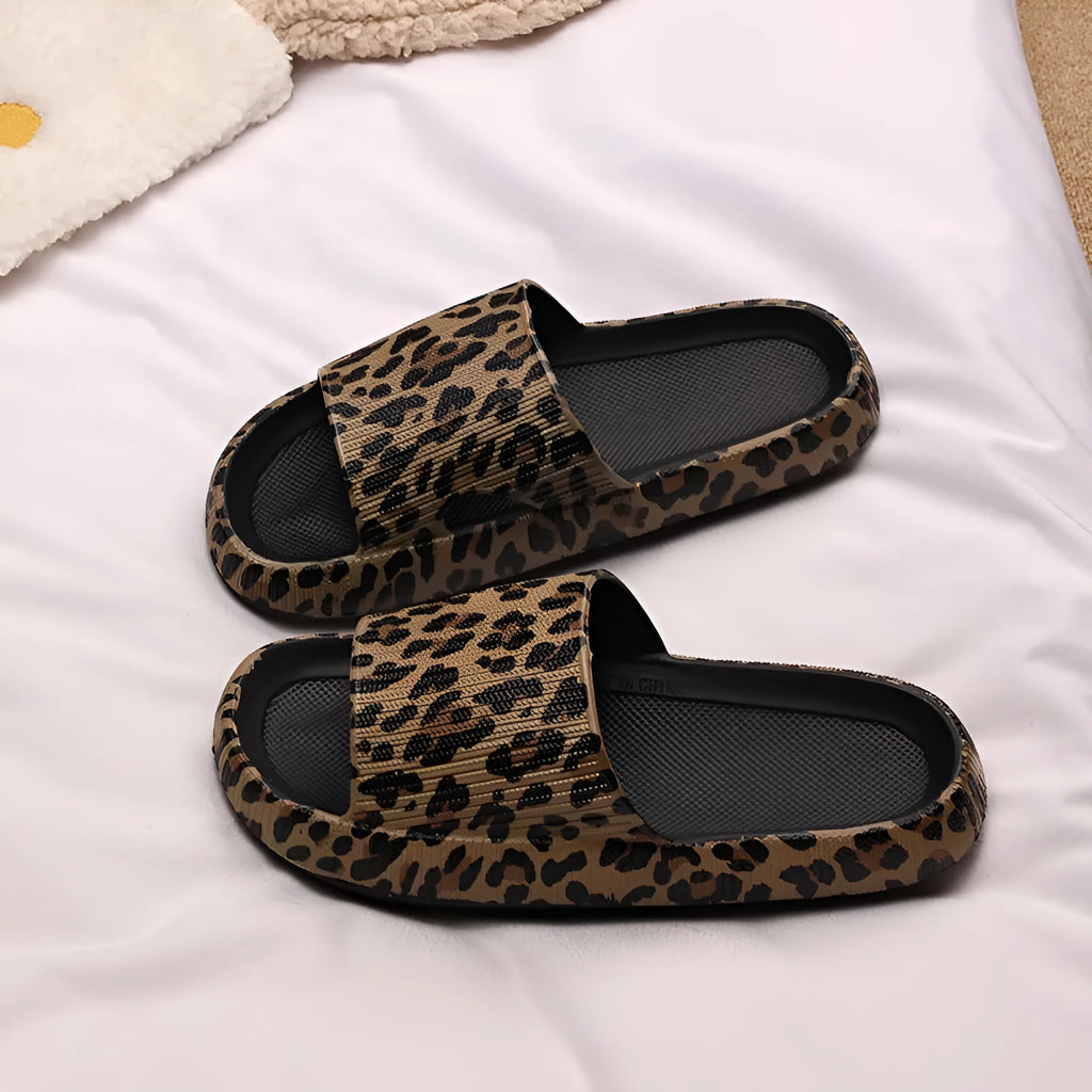 Women's leopard print EVA slippers with thick sole in black, pink, white zebra and khaki animal print colours