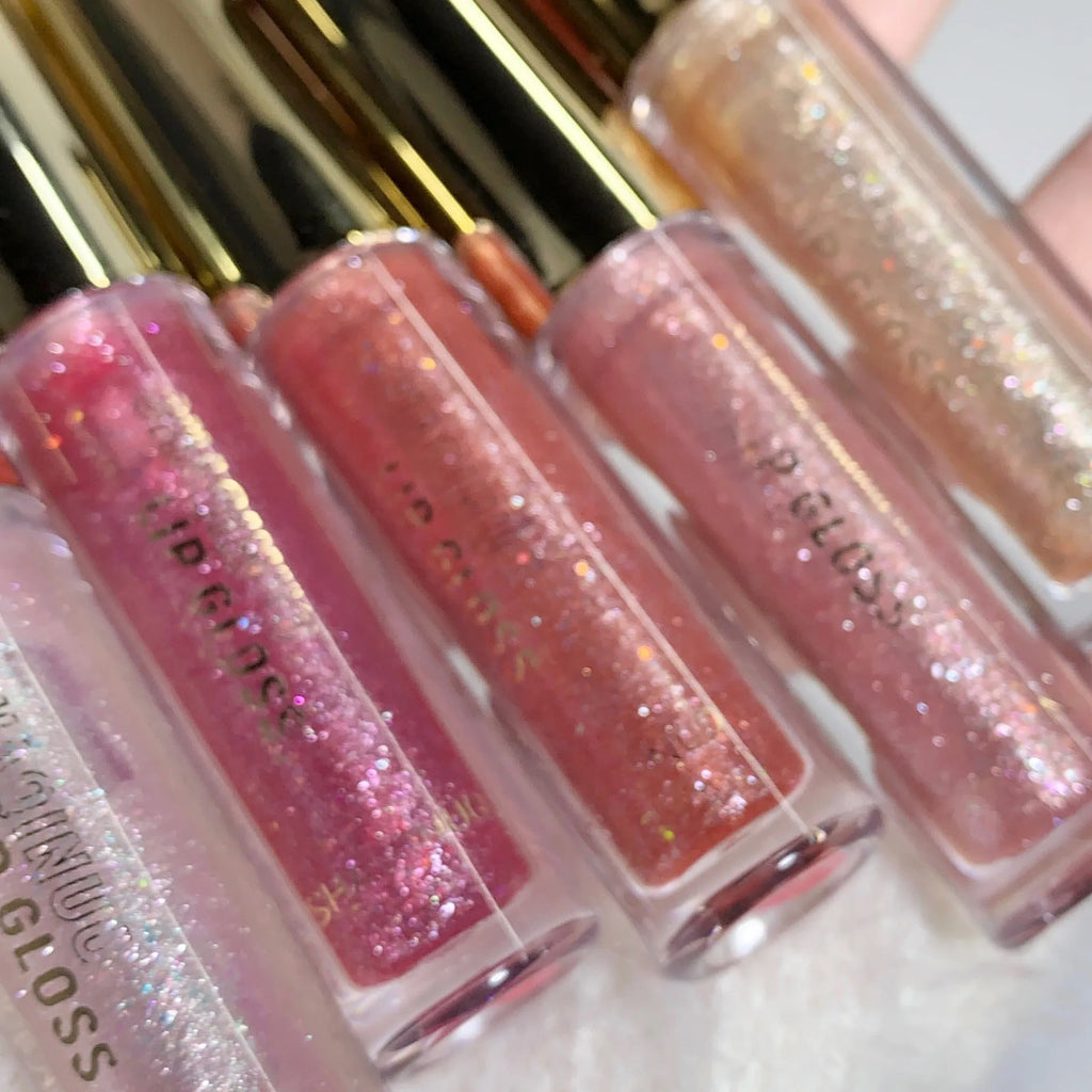 Moisturising rich flash lip gloss in cherry blossom powder, standard tube with water light mirror finish