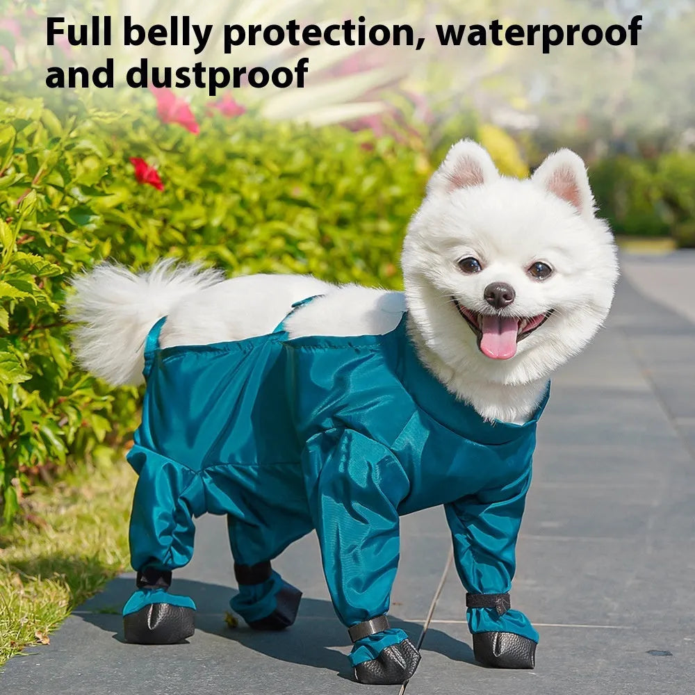Peacock blue pet diaper bag belly jumpsuit made of waterproof memory cloth, laid flat showing foot-wrapped design