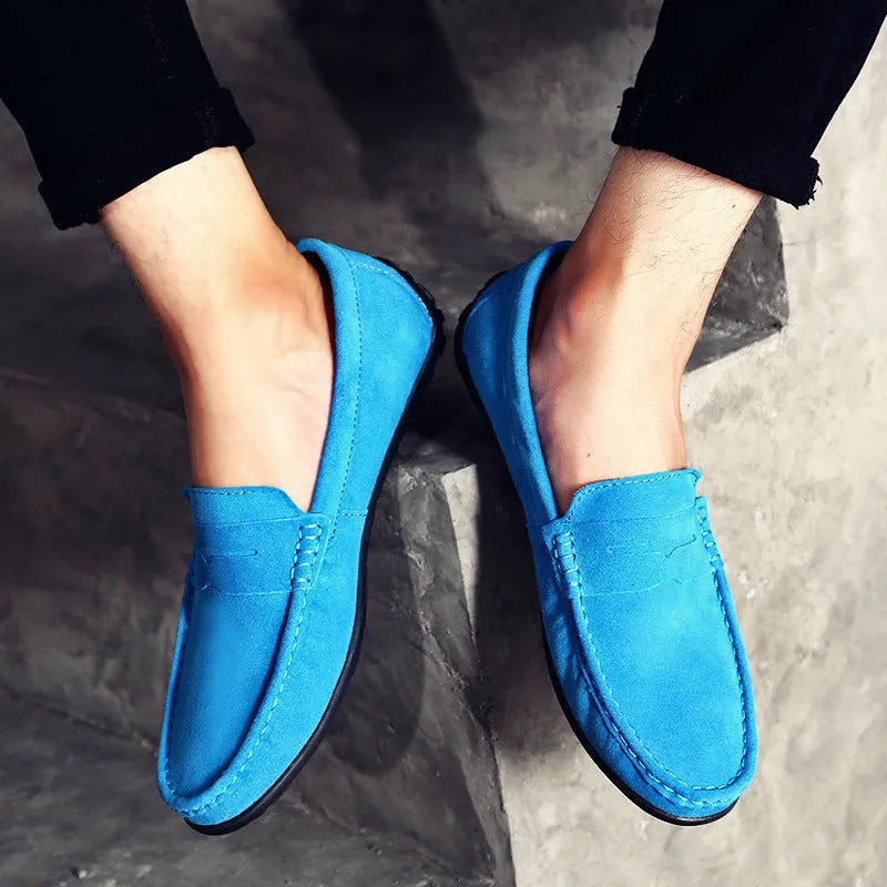 Men's suede Gommino loafers in brown with a round toe and flat rubber sole