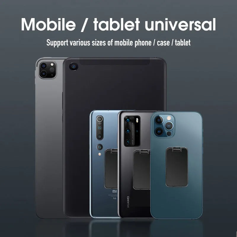Foldable zinc alloy phone holder ring buckle in silver on a desk propping an iPhone at an angle.