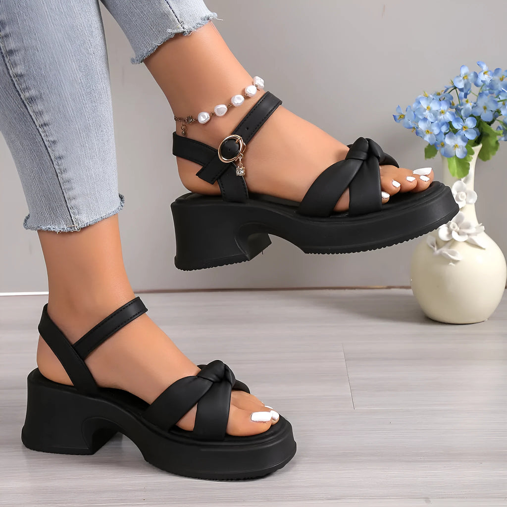 Thick heel slippers for women, black PU upper, rubber sole, button fastening, round toe, side view