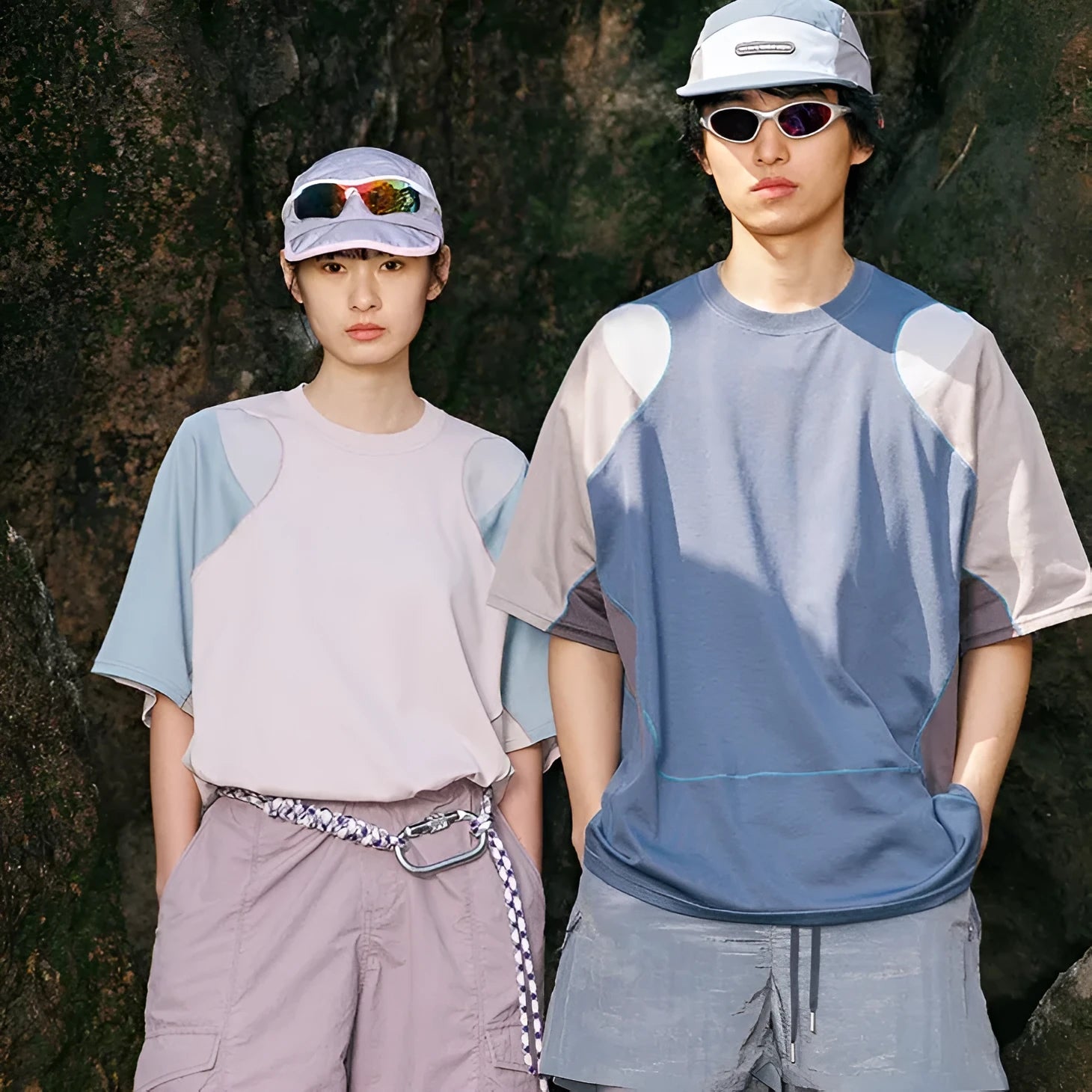 Men's loose blue patchwork contrast sports t-shirt with raglan sleeves on a hanger