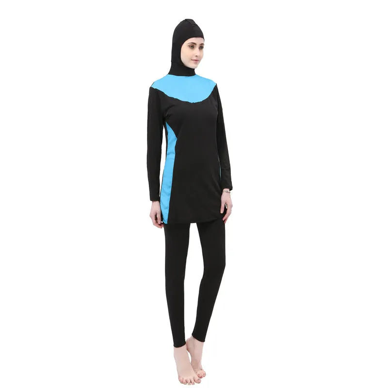 Conservative long-sleeved hooded women's swimsuit in black with coloured trim.