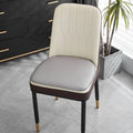 Leather horseshoe-shaped seat cushion in beige colour showing curved back support design