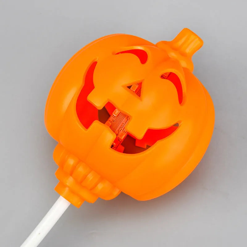 Plastic pumpkin lamp with USB cable, purple or yellow light option, 8.3cm wide by 22cm tall