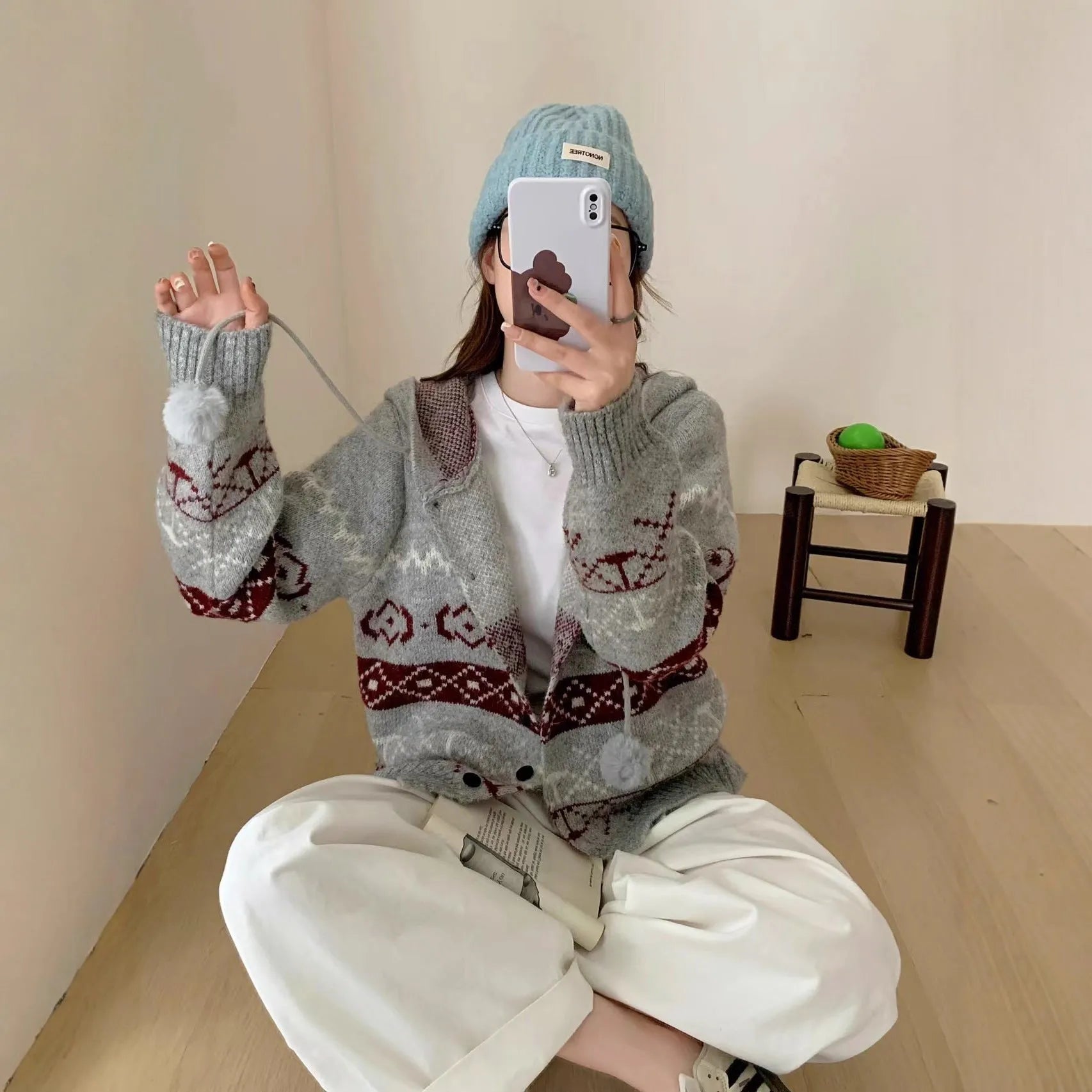 Women's brocade sweater coat with geometric pattern in milky white colour