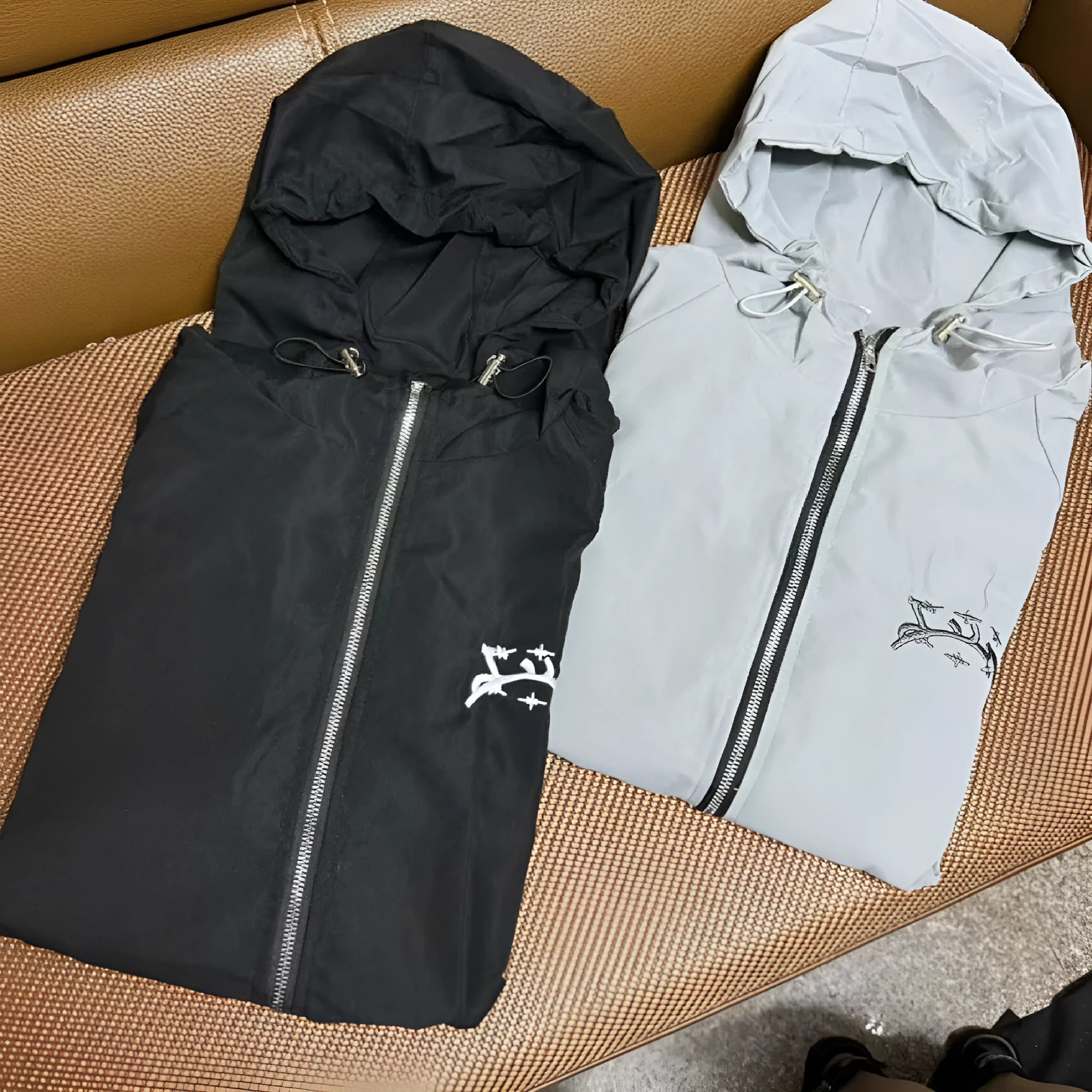 Men's grey British style hooded sunscreen jacket with loose polyester fit