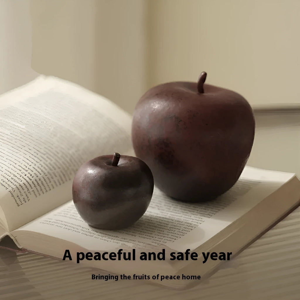 Retro Chinese style ceramic simulation apple ornament for desktop decoration on a wooden surface.