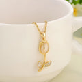 Gold-toned zircon tulip pendant necklace on titanium steel O-ring chain with adjustable 41-50cm length