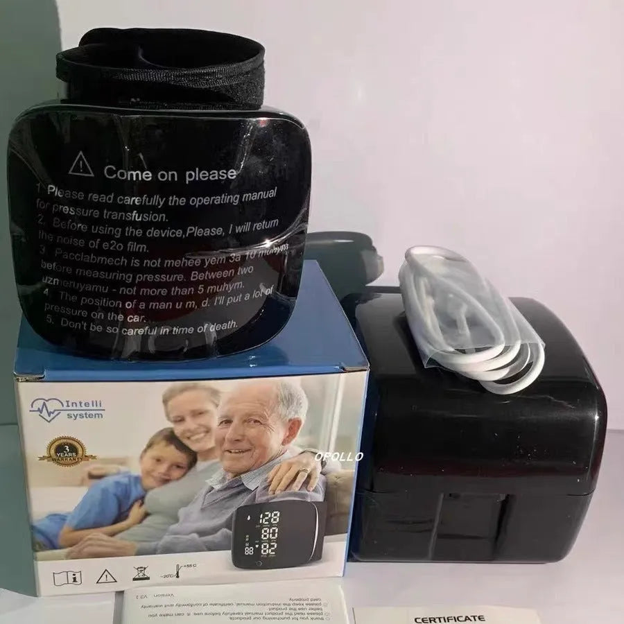 Black wrist blood pressure monitor with USB charging cable and multilingual voice options