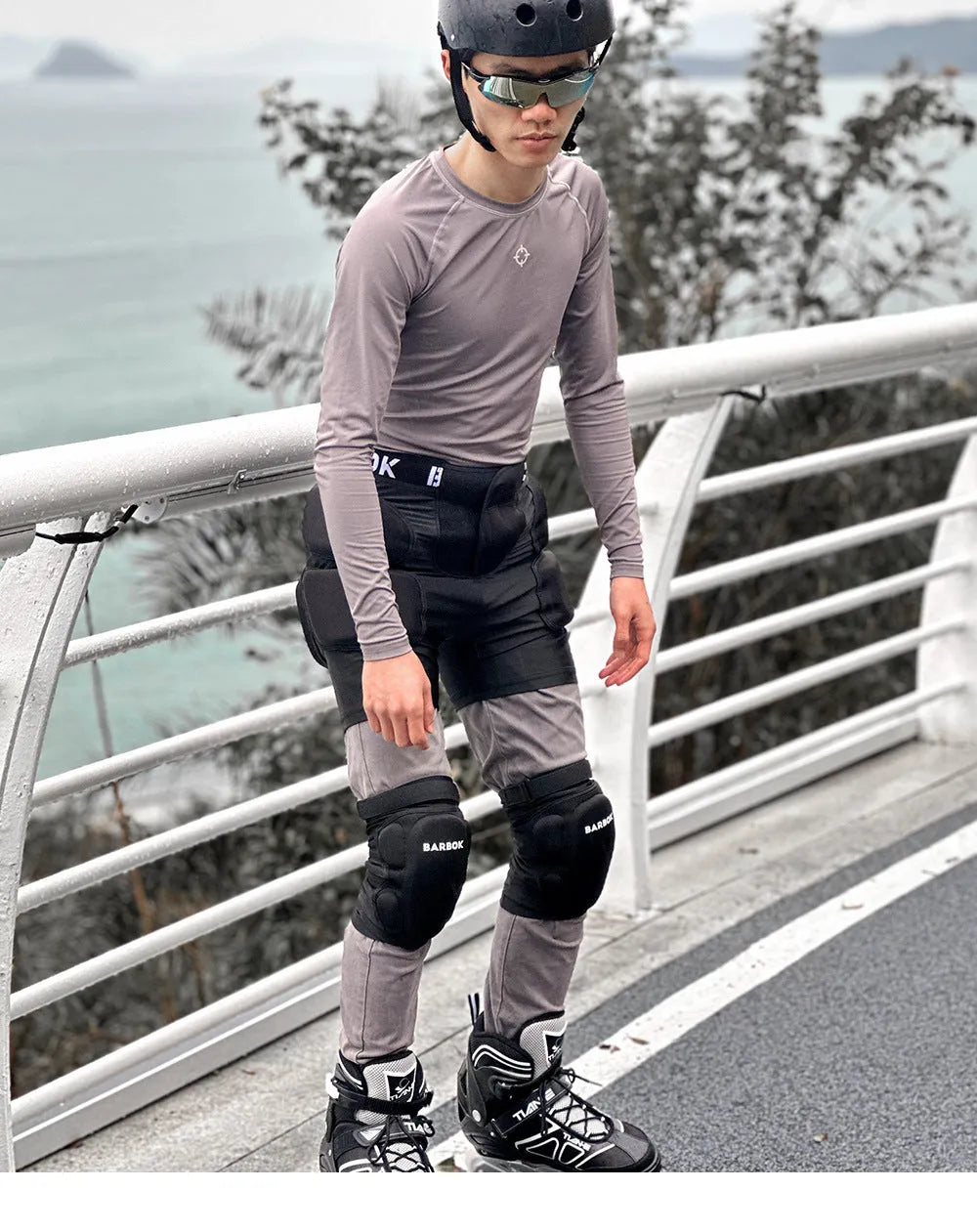 Adult black protective padded shorts with hip and tailbone padding for roller skating and skateboarding