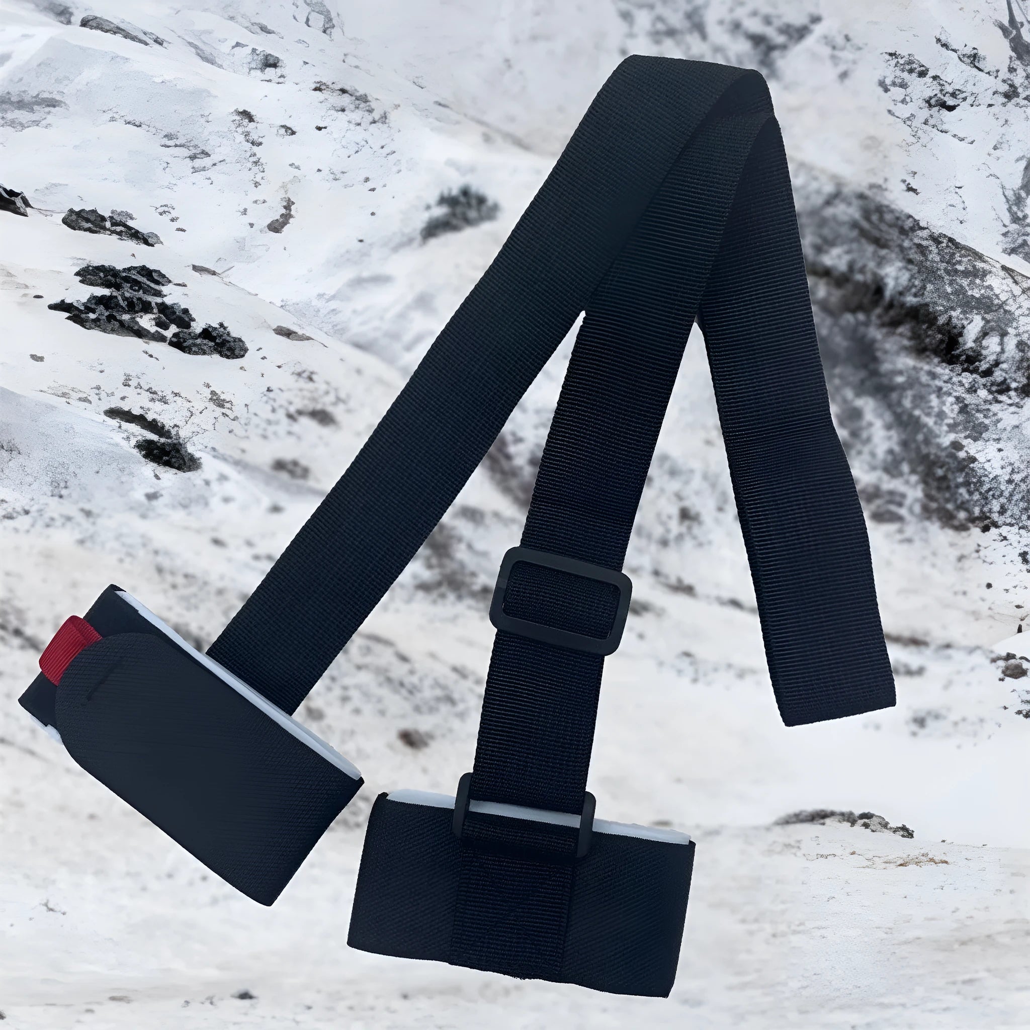 A black adjustable hook and loop shoulder strap for carrying a sled, showing the fixed sewing construction.