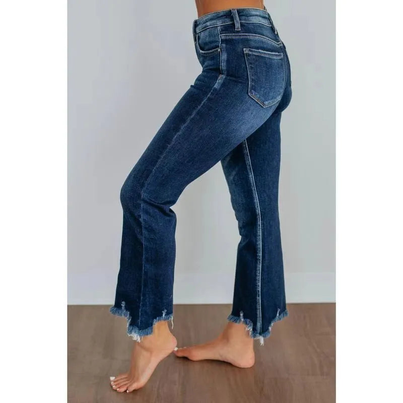 Women's solid colour cotton denim jeans with manual distressing in dark blue and light blue options