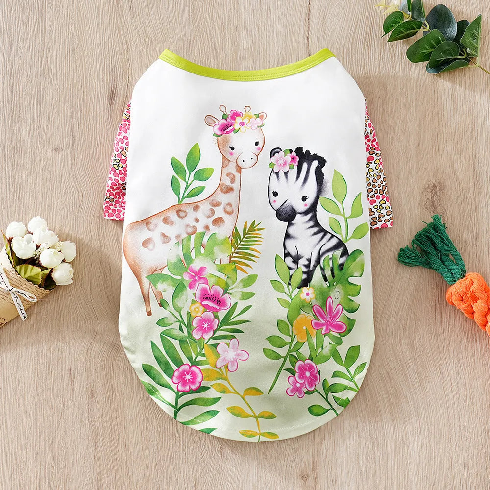 Colourful printed polyester t-shirt for a small dog, showing size options S, M, L, XL, XXL.