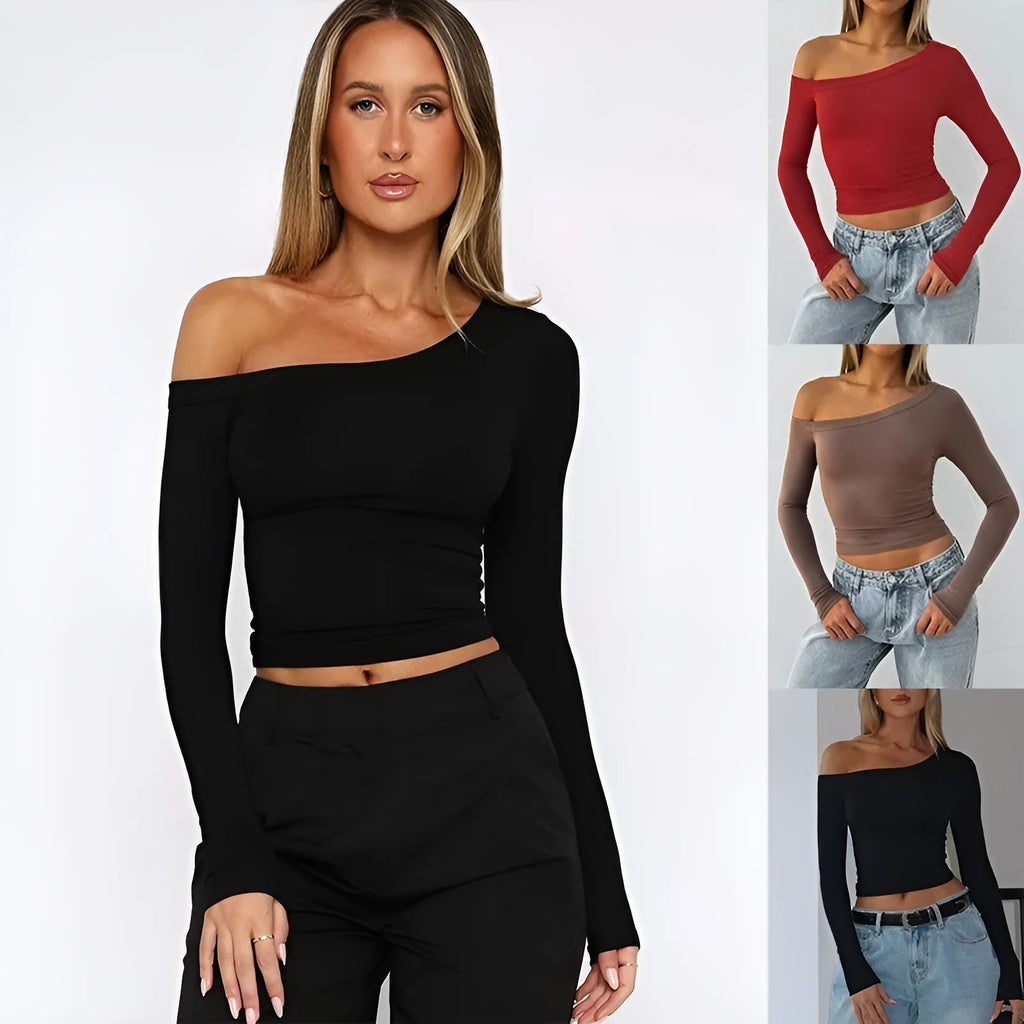 Women's slim fit knitted cardigan in black with long sleeves and decorative cross shoulder straps.