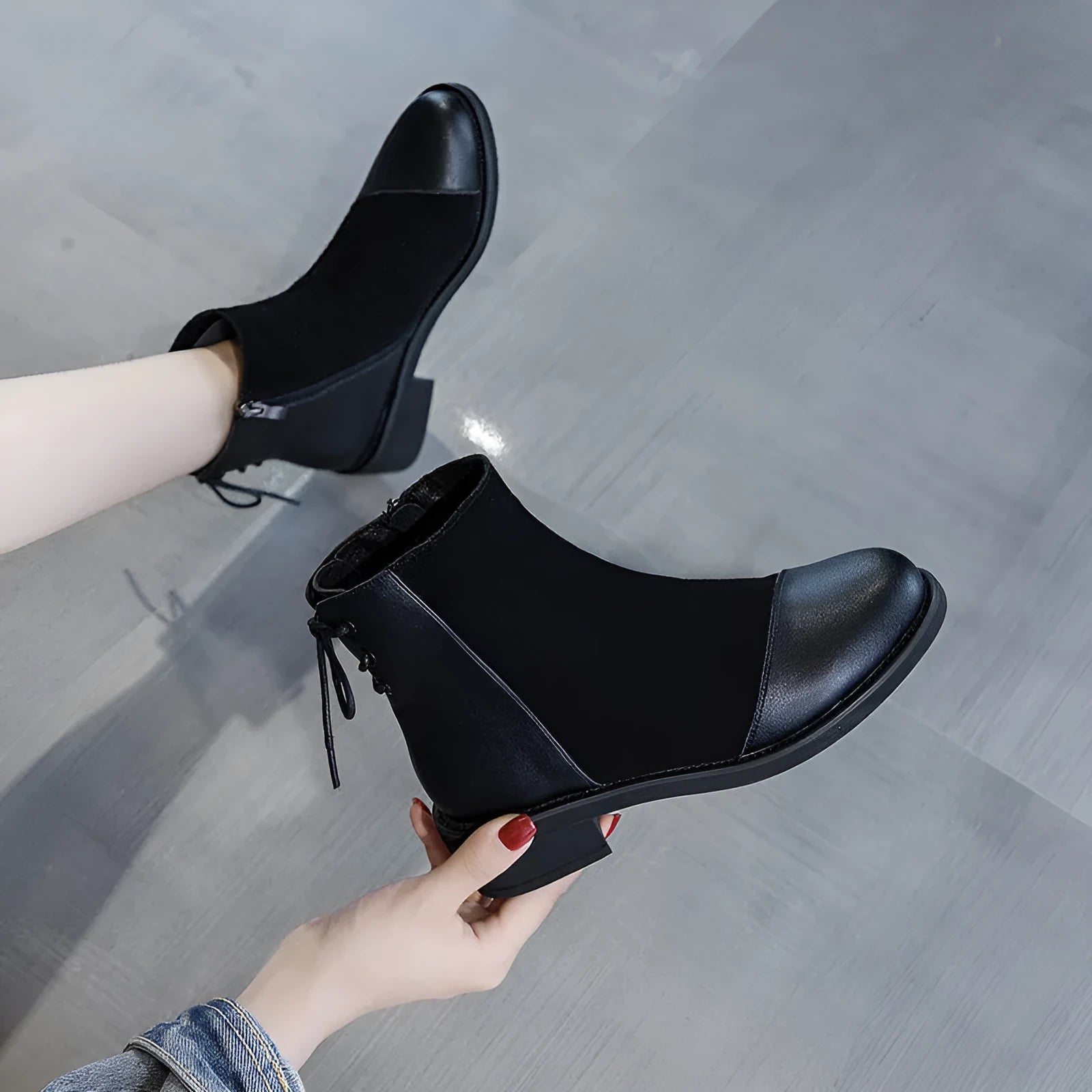 Black women's Martin boots with side zip, round toe, and short stout heel