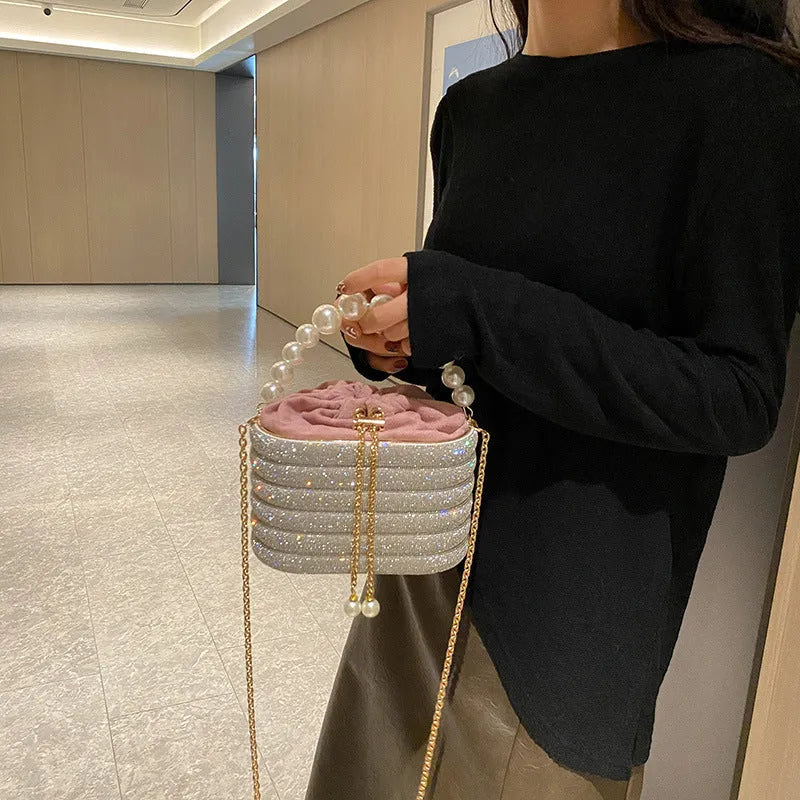 Round women's crossbody handbag with beaded pearl embellishments and European retro styling in multiple colour options