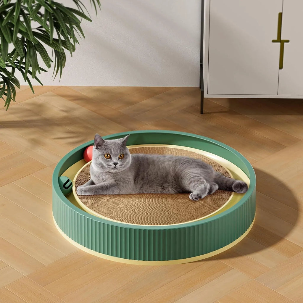 Large circular cat scratching board with ball toys showing green colour and refillable core design
