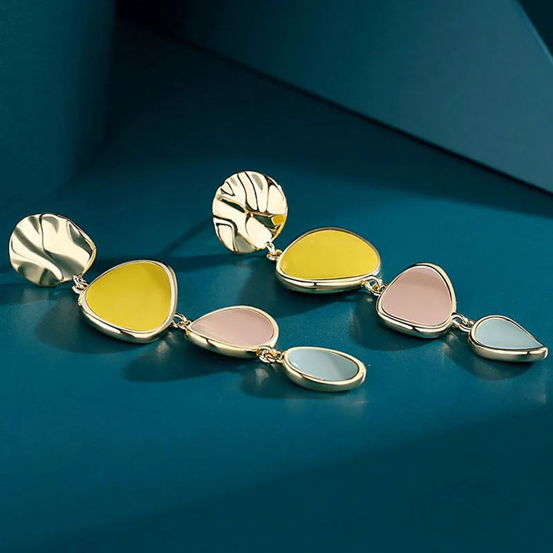 Morandi three-colour oil drip pattern on wafer-thin alloy disc earrings with sterling silver needles.