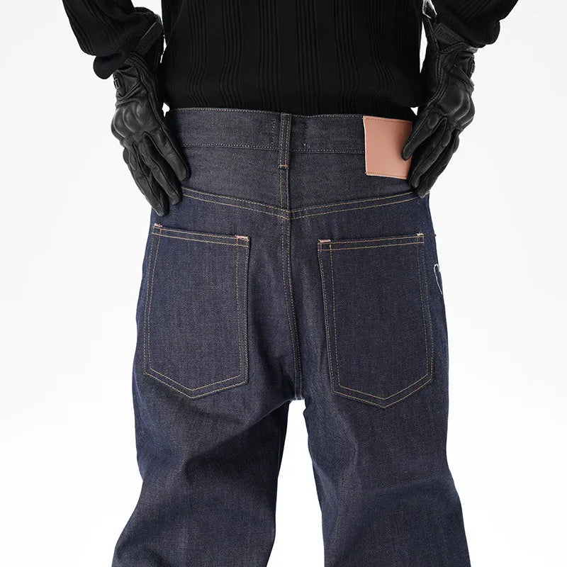 Casual loose straight original jeans in dark blue denim fabric, front view, showing loose straight leg cut.