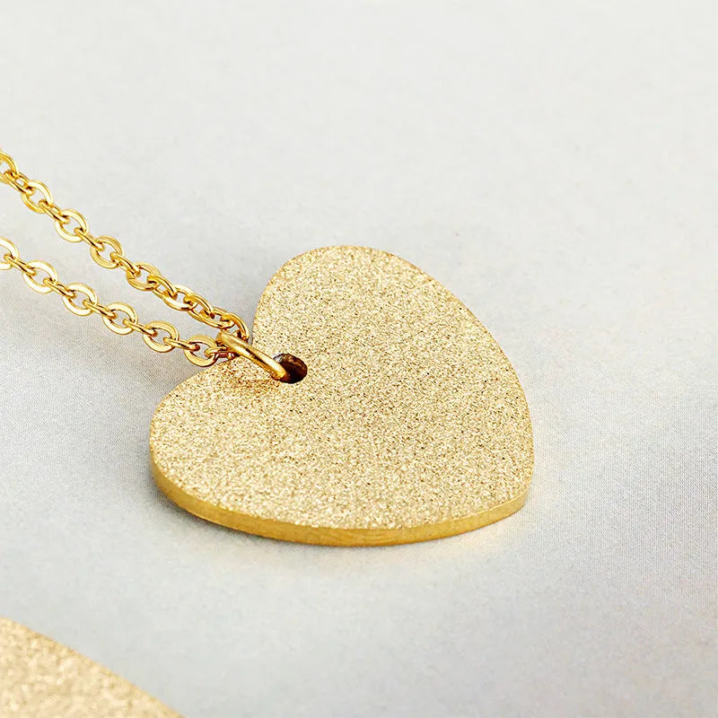 Women's geometric heart pendant necklace in titanium steel with minimalist design