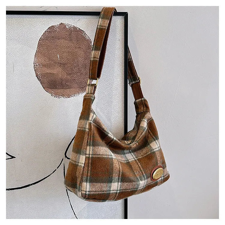 Large capacity soft woolen shoulder bag for women in khaki with pendant, horizontal square shape with sewing line detail.
