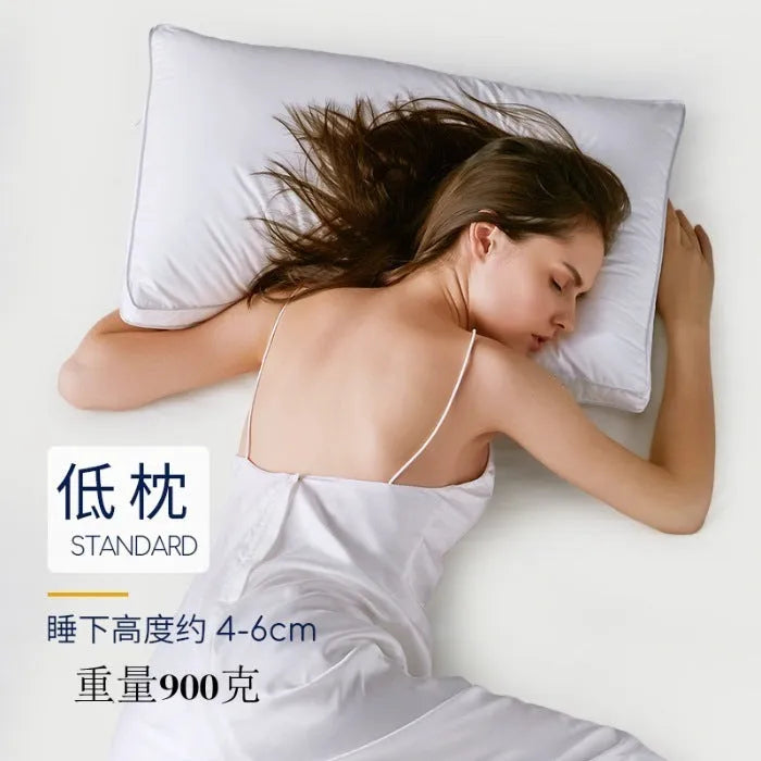 White cotton satin stripe feather pillow showing satin stripe detail on 99% cotton fabric.