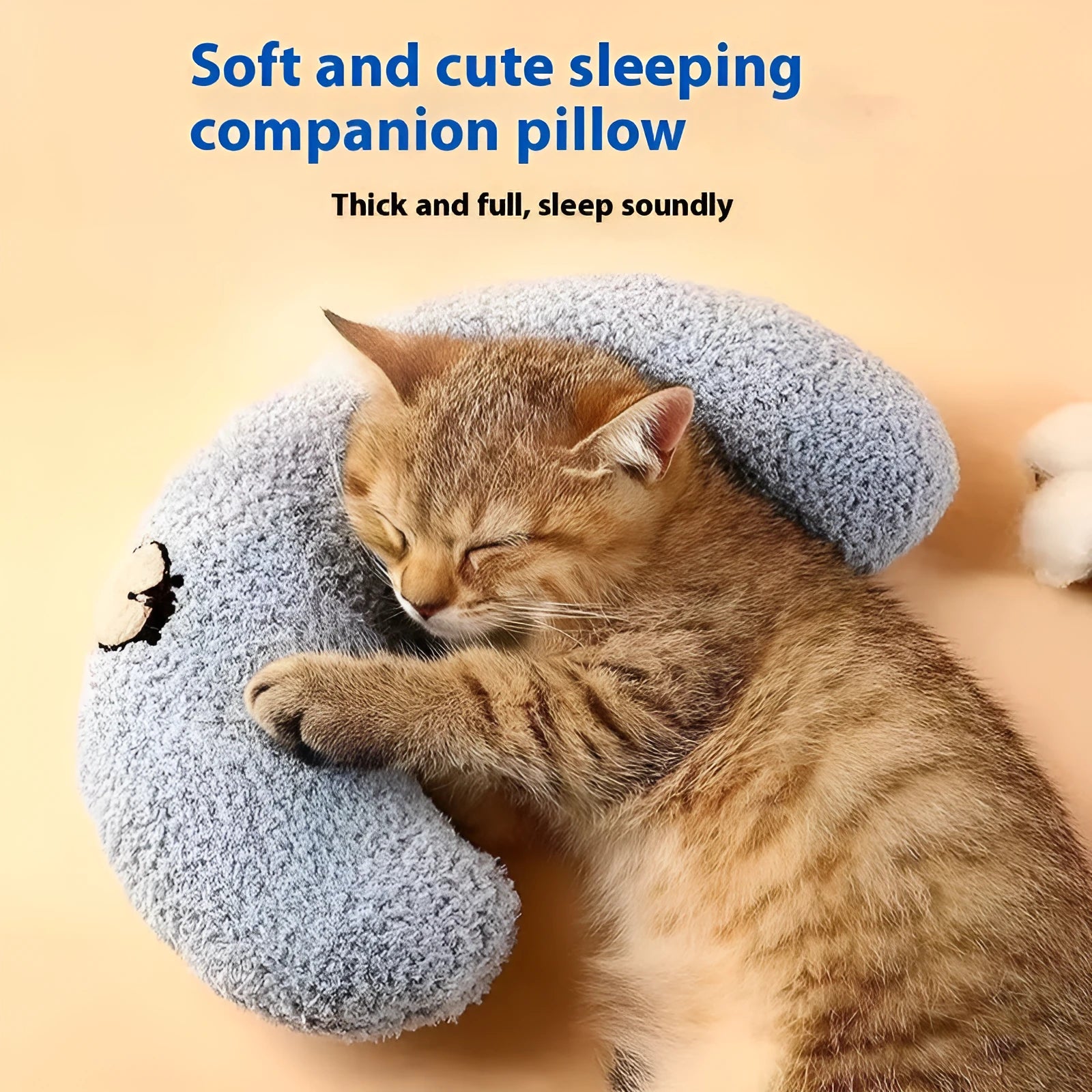 Blue U-shaped cat neck protection pillow with moon design on cloth material