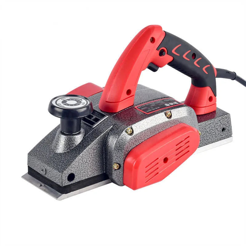 Red desktop electric wood planer with aluminium body showing 82mm planing width and power cord