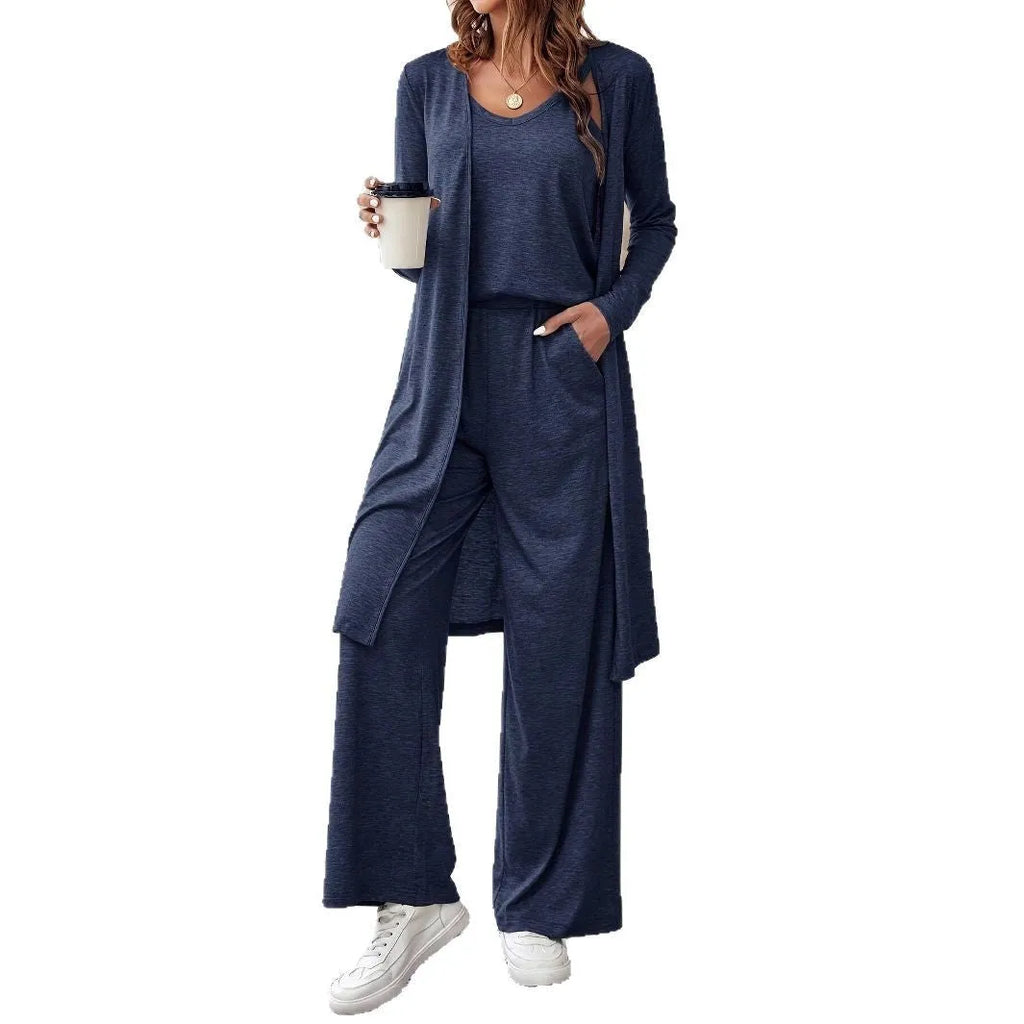 Women's blue polyester co-ord suit set with sling top, long cardigan, trousers and suspenders