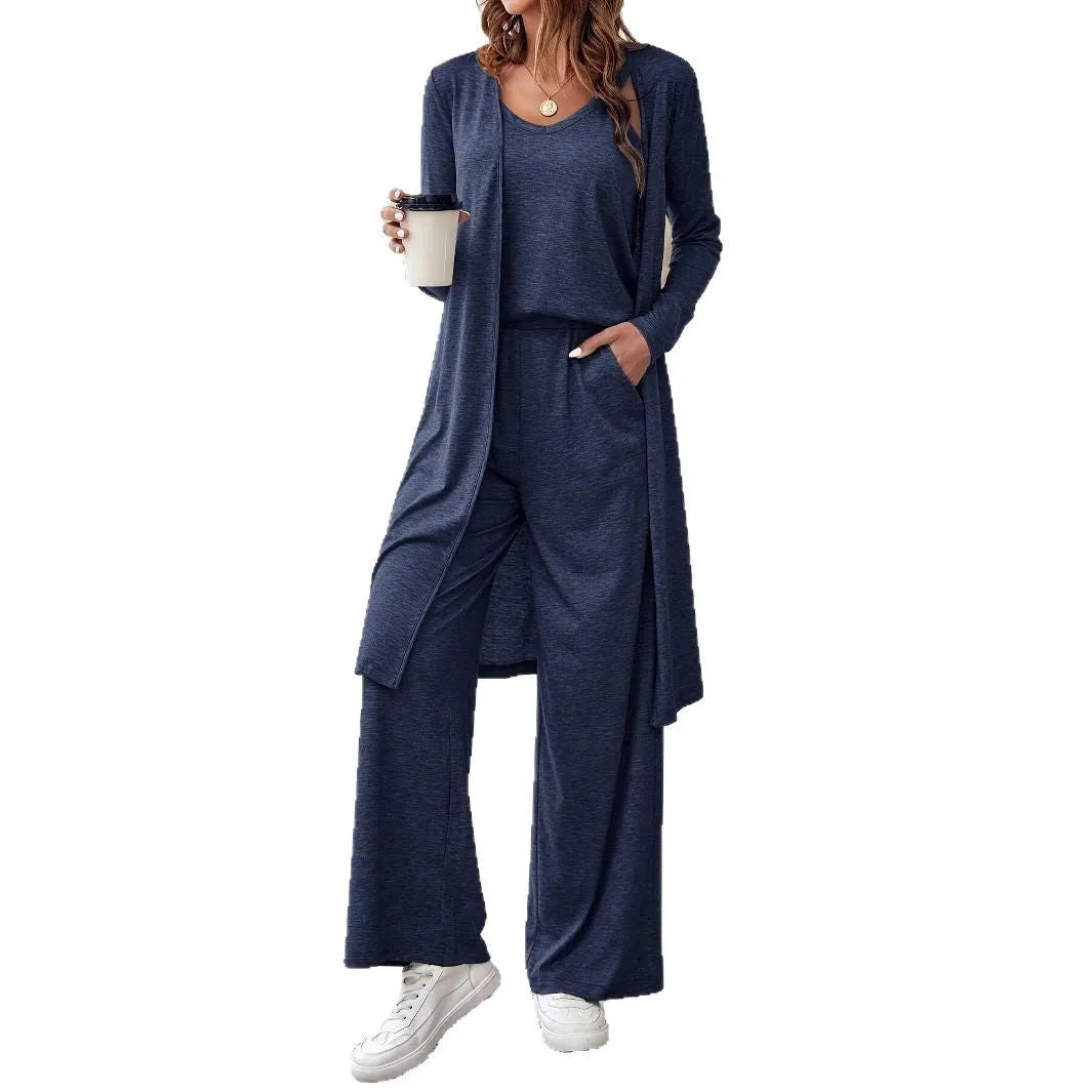 Women's blue polyester co-ord suit set with sling top, long cardigan, trousers and suspenders
