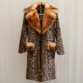 Women's long leopard print faux fur jacket with regular sleeves.