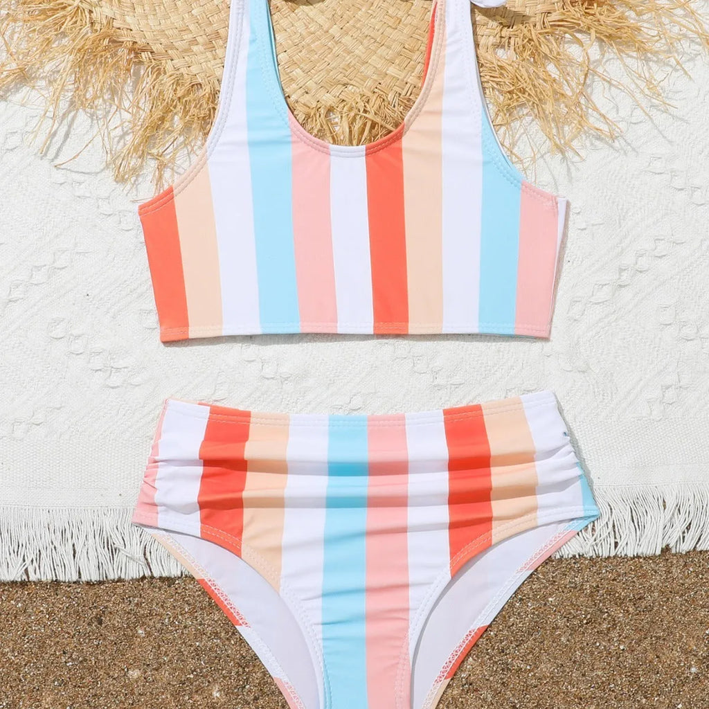 Girls printed plaid pattern seaside vacation swimsuit in brief style with polyester lining, available in multiple sizes