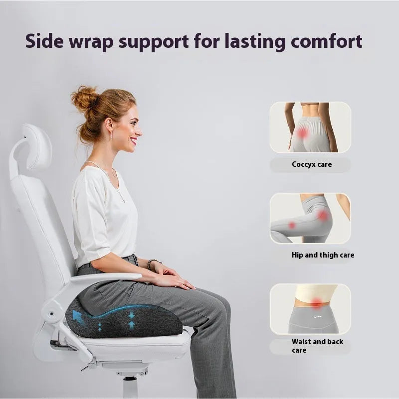 Light grey memory foam office chair cushion measuring 46x43x12cm on a chair