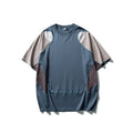 Men's loose blue patchwork contrast sports t-shirt with raglan sleeves on a hanger
