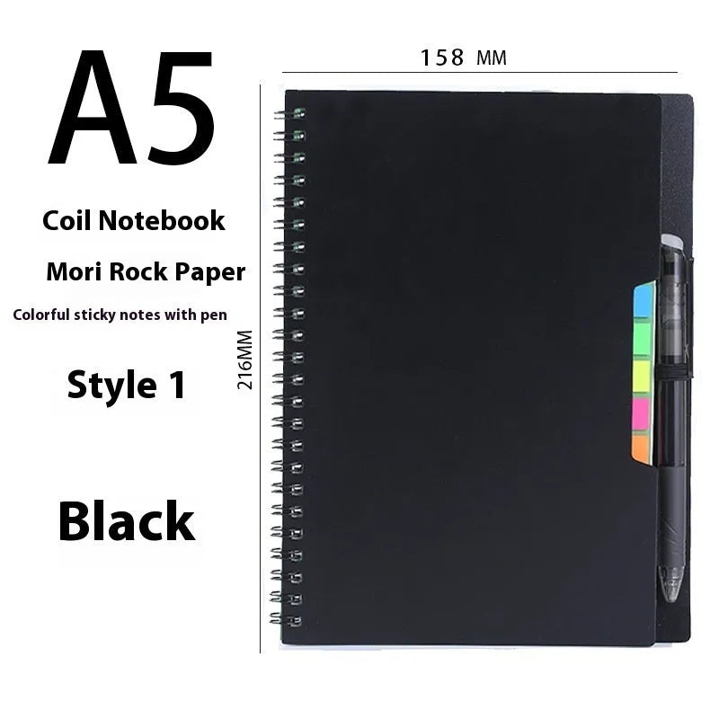 A5 coil-bound erasable notebook with waterproof stone paper in a customisable cover, shown with a pen.