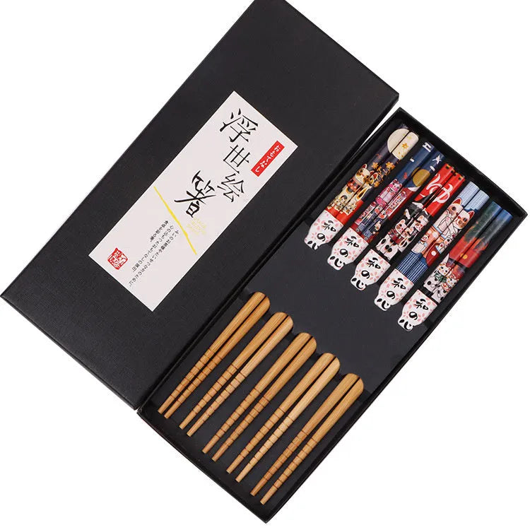 Five pairs of bamboo chopsticks with colourful Japanese lucky cat cartoon design.