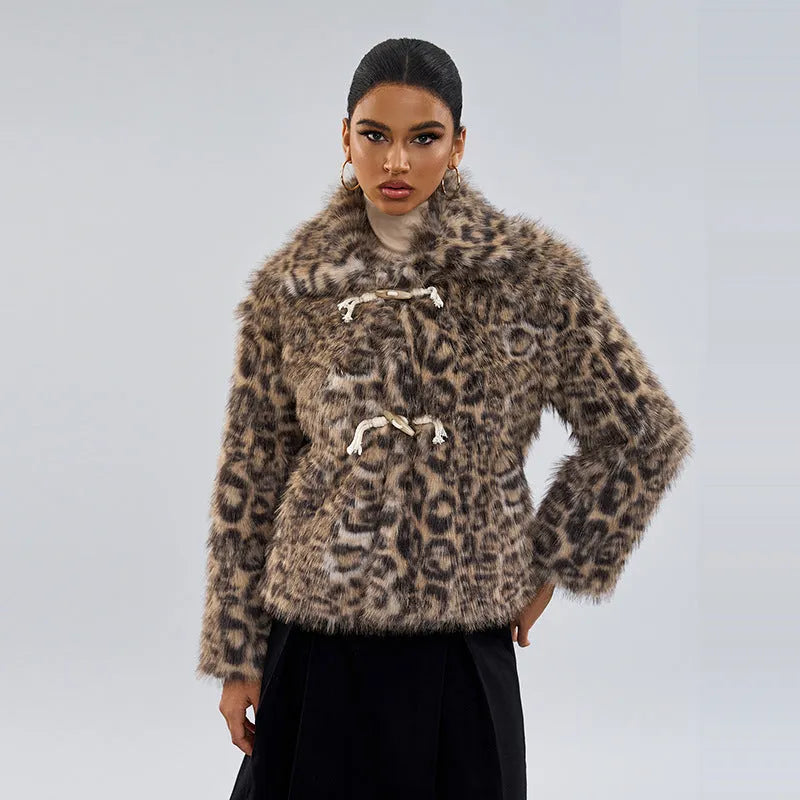 Women's leopard print coat with a buckle lapel closure and regular sleeves.