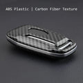 Plastic remote control protective shell with a buckle fastener for a car key.