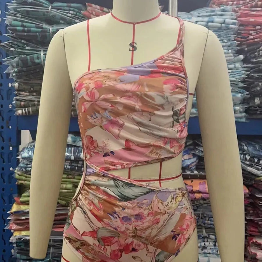 Women's rose gold patterned swimsuit made from polyester fibre, available in sizes S to XXXL