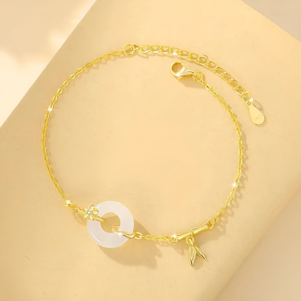 White chalcedony bracelet with peace buckle in silver gold electroplated finish on silver base