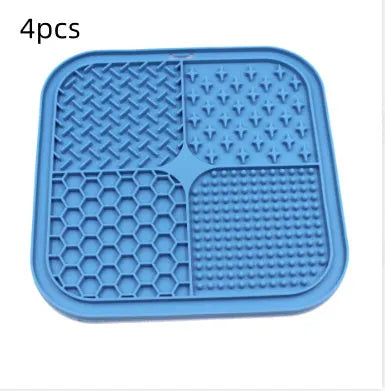 Green silicone pet licking pad 20x20cm with suction cup base on a tiled floor
