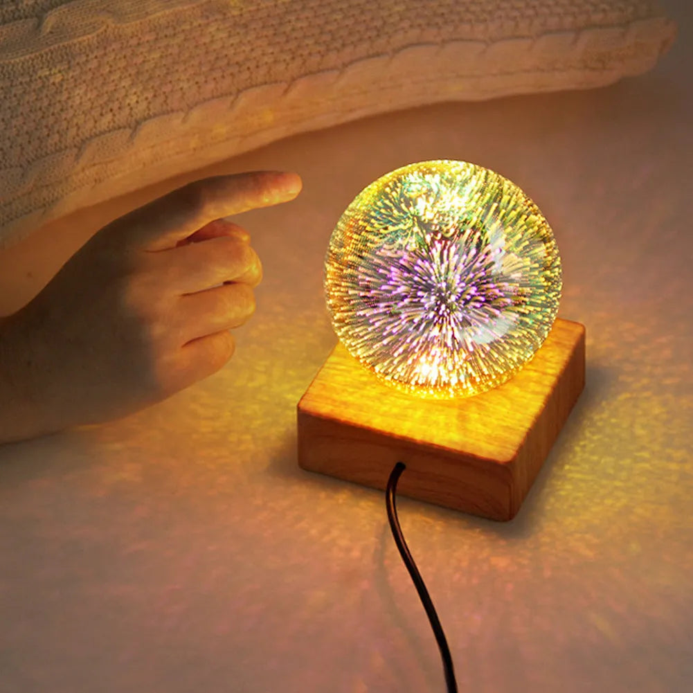 USB 3D firework crystal ball night light with touch control on a wooden table, warm LED glow effect