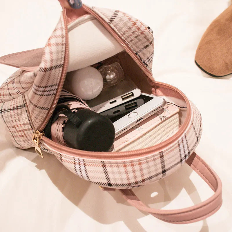 One shoulder diagonal phone bag in PU leather available in black, blue, brown, pink, and red colours.