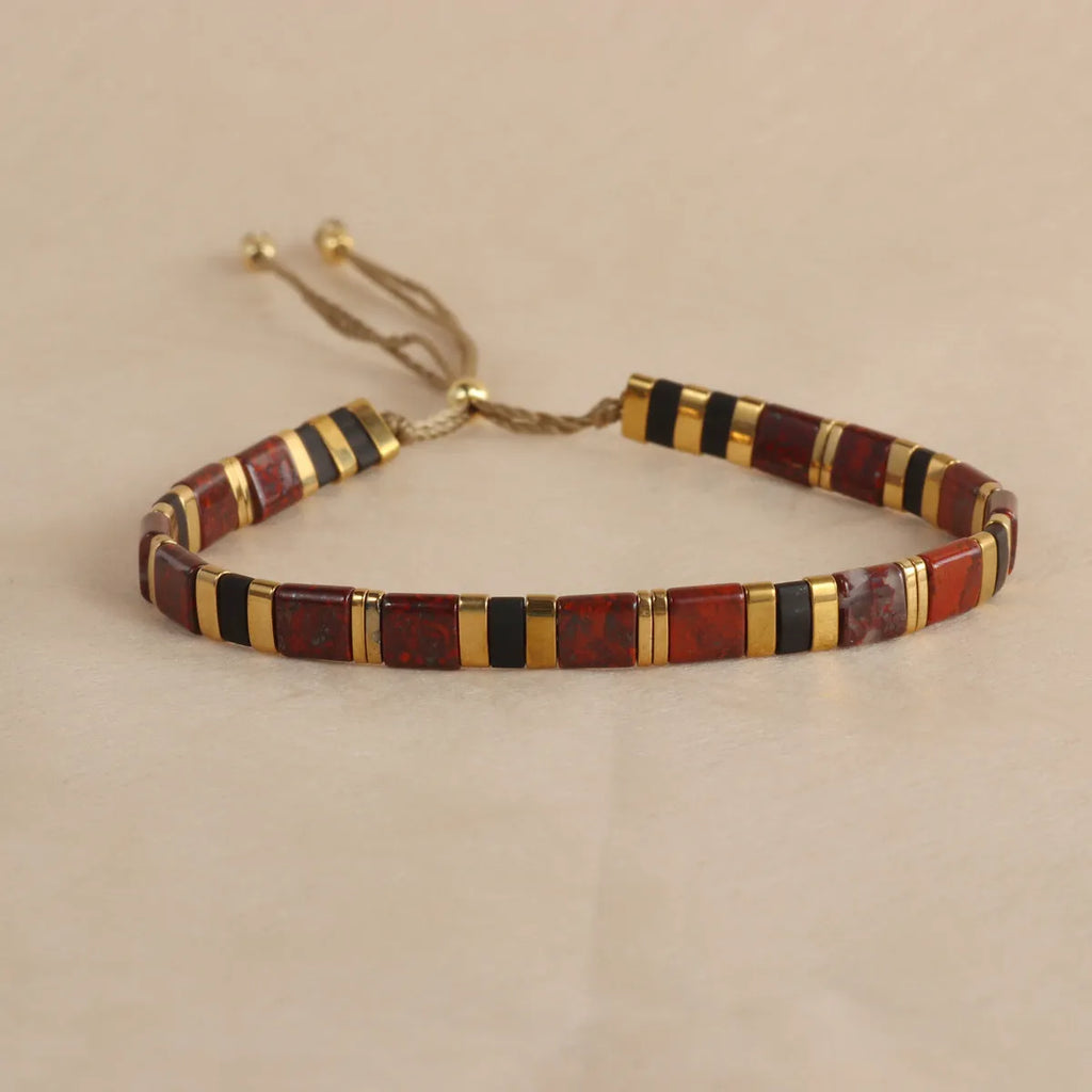 Geometric glass bead bracelet in round design with coloured glaze accents